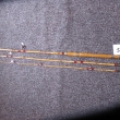 č. 44-třídílný světlý bambusový- délka 300 cm- naváděcí a koncové očko skleněné- ostatní drátěná- vývaz tmavě červená- rukojet dřevěná s kroužky- cena 1500 Kč