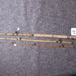 � 67- t��d�ln� kombinovan�- prvn� dva d�ly sv. bambus- �pi�ka �t�pan� bambus- o�ka sklen�n�- d�lka 235 cm- v�vaz zeleno �erven�- rukojet korek a krou�ky- cena 1450 K�
