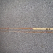 10R . Dvoudílný štípaný bambusový prut Rousek , naváděcí a koncové očko opálové, ostatní drátěná, délka 250cm, cena 1600Kč